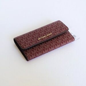 Michael Kors Jet Set Large Logo Trifold Wallet in Oxblood